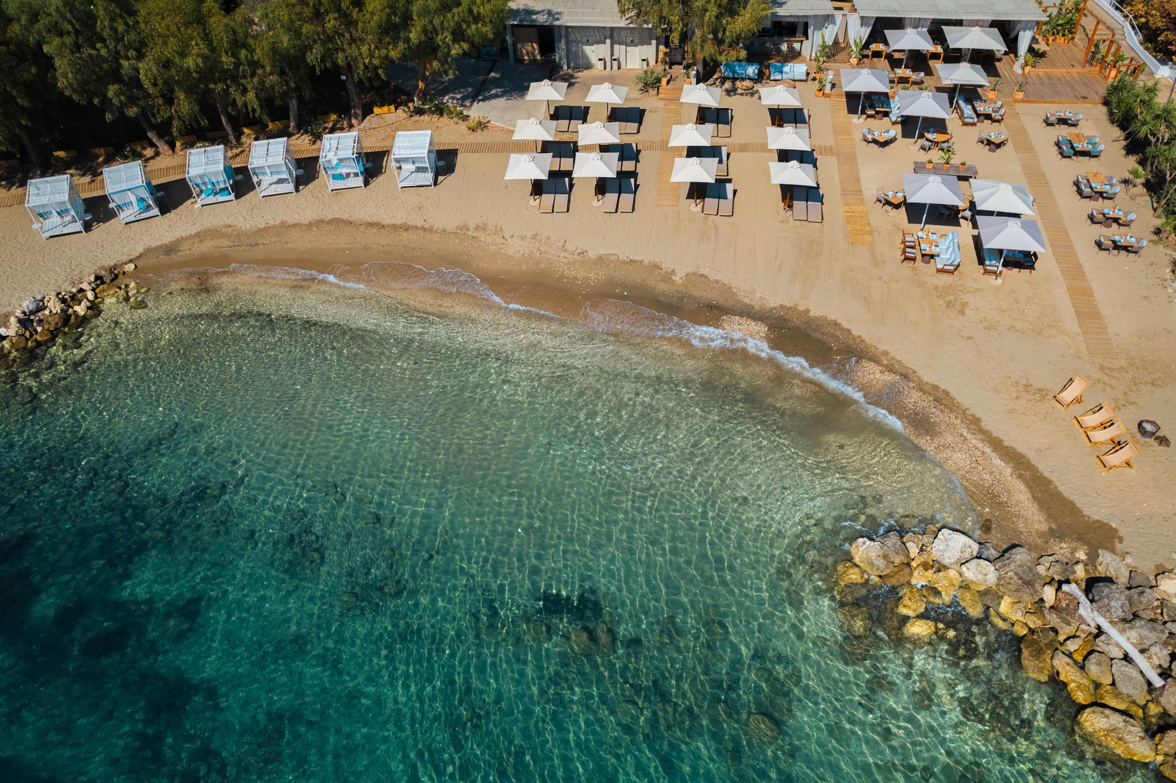 emerald beach with crystal clear waters aerial photo